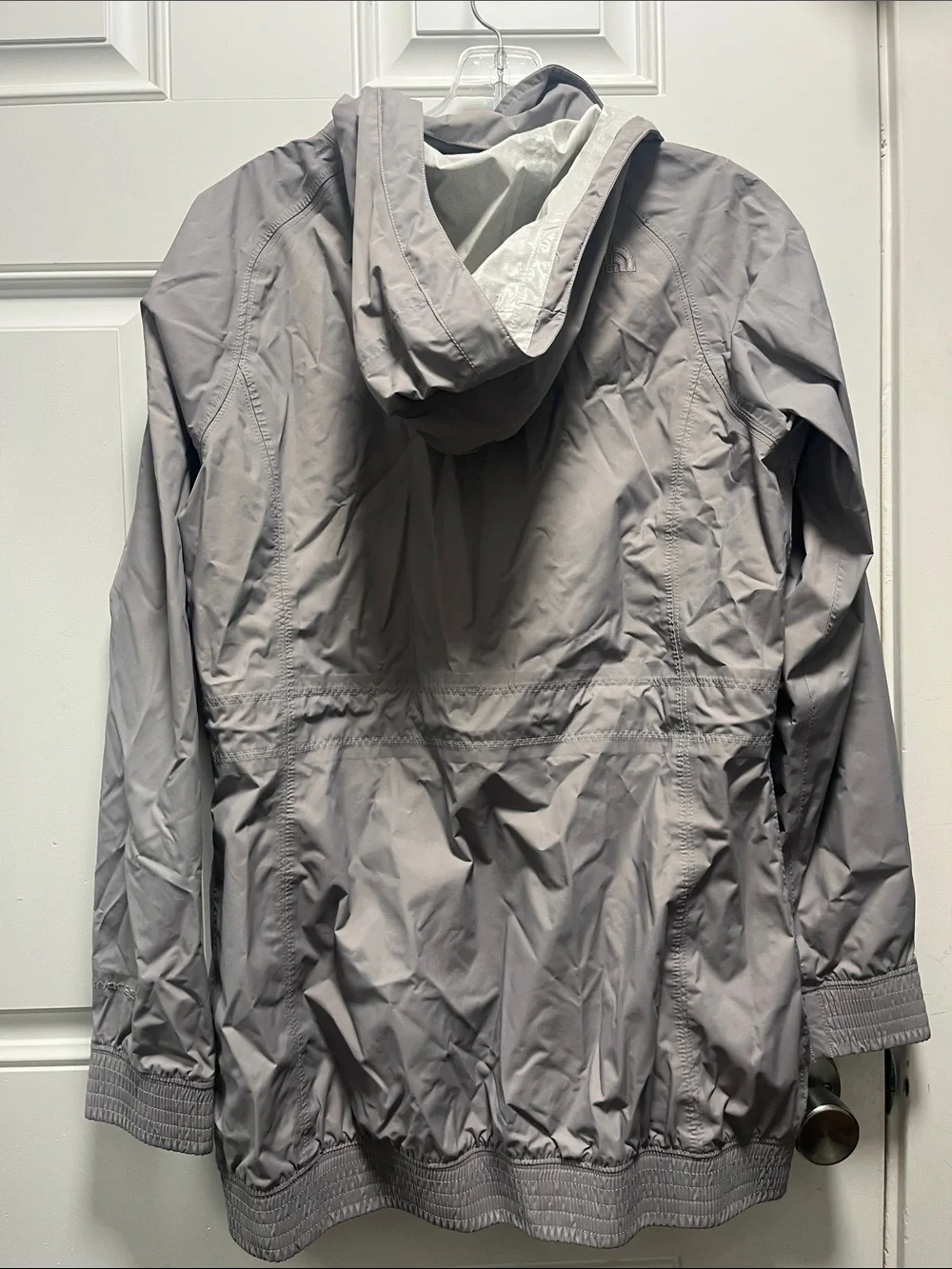 The North Face Light Gray women’s' Hooded Rain Jacket